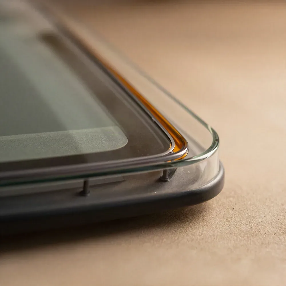 Close-up of a chip in a windshield being repaired